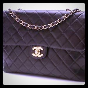 Chanel
Classic Flap Quilted Jumbo Black Lambskin
